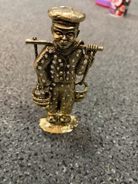 Gold Tone Pierced Metal Figurine - Water Carrier